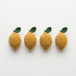 Brightly colored handmade crocheted lemon