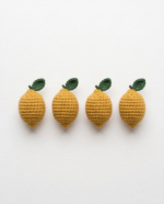 Brightly colored handmade crocheted lemon